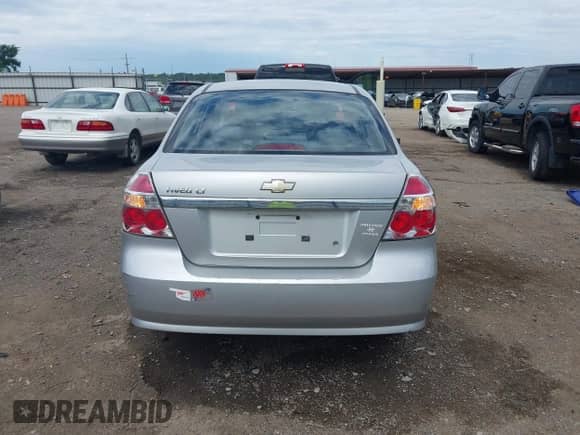 2008 Chevrolet Aveo LT z VIN KL1TG56678B069082, wystawiony jako IAAI lot #42314421 z przebiegiem 164 296 mil mil oraz . Historia ofert i sprzedaży dostępna na DreamBid. Obrazek 16.