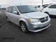 2011 Dodge Grand Caravan Mainstreet with VIN 2D4RN3DG4BR743239, listed as a IAAI auction lot 43437423 with 133,069 mi miles and . Bid and sale history available at DreamBid. Image 1.