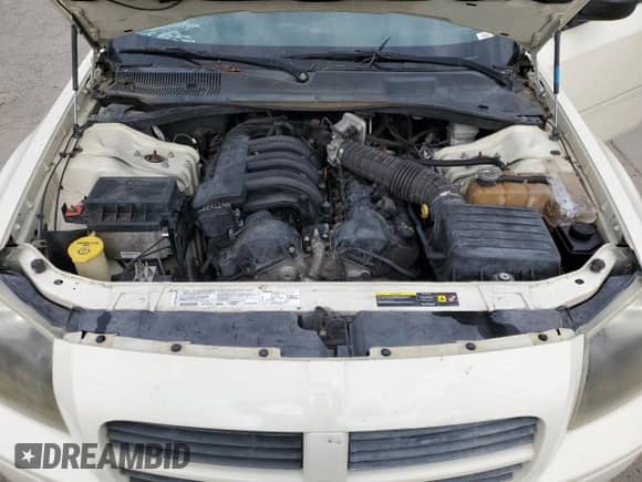 2005 Dodge Magnum SE с VIN 2D4FV48TX5H692873, выставлен на аукционе Copart как лот 87230504 с пробегом 166 497 миль миль и Списание • Salvage title. История ставок и продаж доступна на DreamBid. Изображение 12.