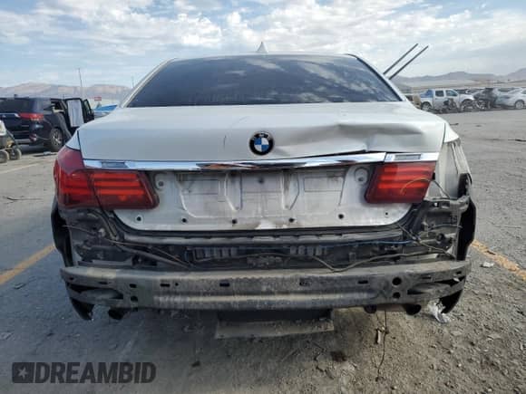 2013 BMW 7 Series 740Li with VIN WBAYE4C5XDDW22670, listed as a Copart auction lot 69883835 with 154,183 mi miles and Salvage title. Bid and sale history available at DreamBid. Image 6.