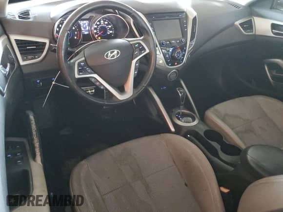 2013 Hyundai Veloster w/Gray Int z VIN KMHTC6AD1DU157409, wystawiony jako Copart lot #85374155 z przebiegiem 151 297 mil mil oraz Szkoda całkowita • Salvage title. Historia ofert i sprzedaży dostępna na DreamBid. Obrazek 8.