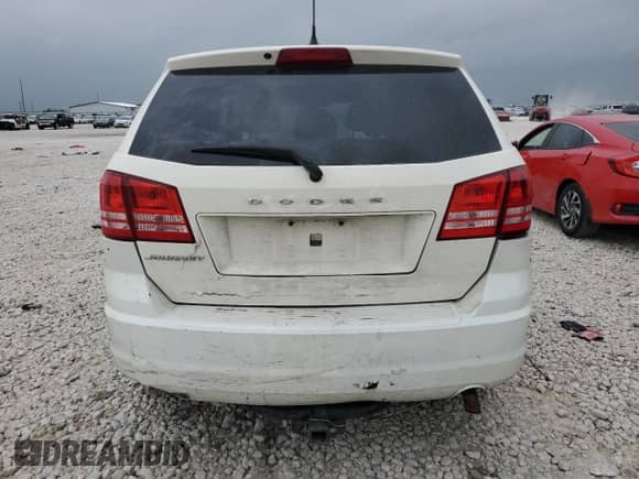 2015 Dodge Journey American Value z VIN 3C4PDCAB9FT675071, wystawiony jako Copart lot #64679335 z przebiegiem 246 918 mil mil oraz Szkoda całkowita • Salvage title. Historia ofert i sprzedaży dostępna na DreamBid. Obrazek 6.