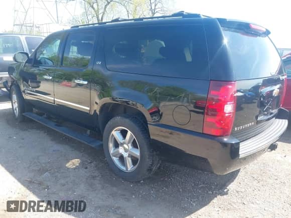 2009 Chevrolet Suburban LTZ z VIN 1GNFK36359R219818, wystawiony jako IAAI lot #42120323 z przebiegiem 146 999 mil mil oraz . Historia ofert i sprzedaży dostępna na DreamBid. Obrazek 3.