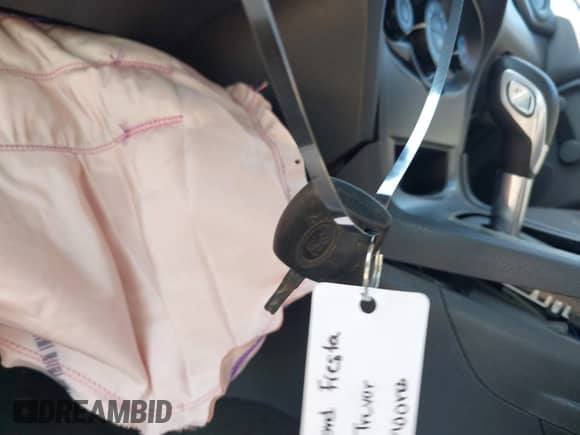 2014 Ford Fiesta S with VIN 3FADP4AJ0EM236329, listed as a IAAI auction lot 43391149 with Not provided miles and . Bid and sale history available at DreamBid. Image 11.