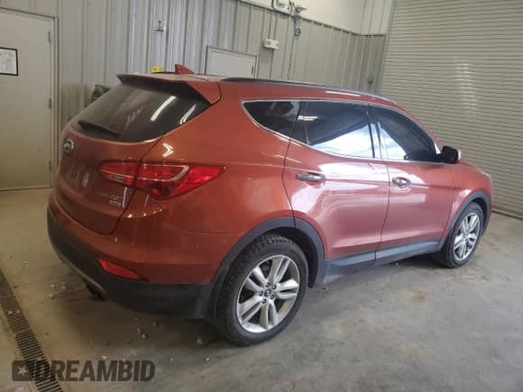 2013 Hyundai Santa Fe Sport z VIN 5XYZUDLA9DG123044, wystawiony jako Copart lot #68886945 z przebiegiem 193 263 mil mil oraz Czysty tytuł • Clean title. Historia ofert i sprzedaży dostępna na DreamBid. Obrazek 3.