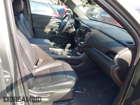 2022 Chevrolet Traverse LT Cloth z VIN 1GNEVGKW9NJ154748, wystawiony jako IAAI lot #40342428 z przebiegiem 26 343 mil mil oraz . Historia ofert i sprzedaży dostępna na DreamBid. Obrazek 5.