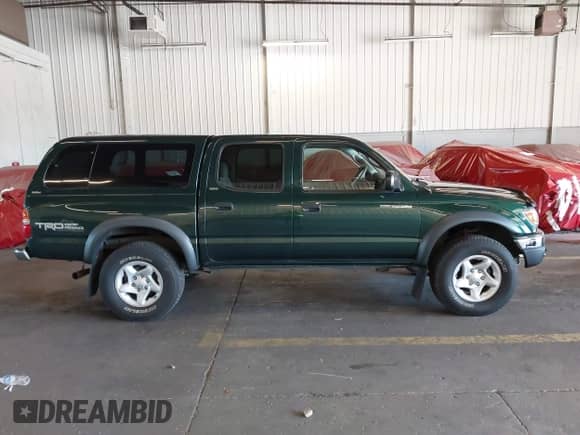 2002 Toyota Tacoma with VIN 5TEHN72N12Z093703, listed as a IAAI auction lot 43227138 with 278,842 mi miles and . Bid and sale history available at DreamBid. Image 13.