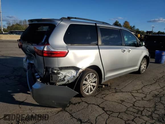 2017 Toyota Sienna XLE with VIN 5TDDZ3DCXHS180951, listed as a Copart auction lot 82366335 with 187,645 mi miles and Salvage title. Bid and sale history available at DreamBid. Image 3.