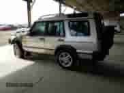 2003 Land Rover Discovery SE с VIN SALTY16493A780402, выставлен на аукционе Copart как лот 57560075 с пробегом Не указан миль и Чистый • Clean title. История ставок и продаж доступна на DreamBid. Изображение 2.