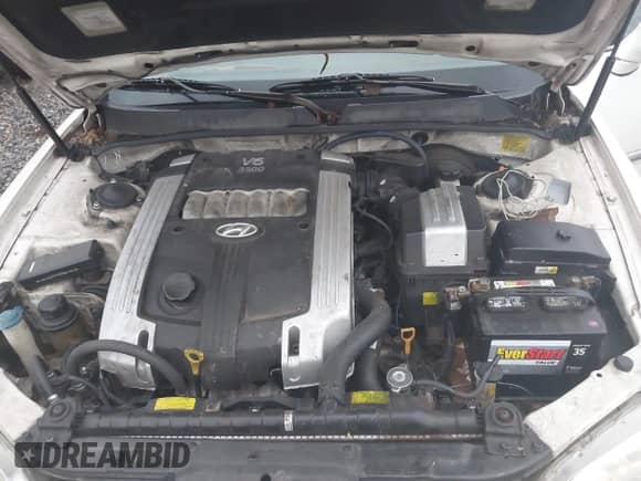 2005 Hyundai XG with VIN KMHFU45EX5A385476, listed as a IAAI auction lot 42476042 with 119,332 mi miles and . Bid and sale history available at DreamBid. Image 10.