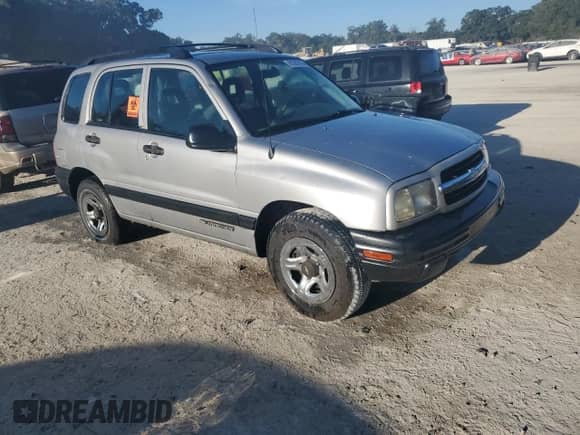 2002 Chevrolet Tracker с VIN 2CNBE13C326912813, выставлен на аукционе Copart как лот 81281745 с пробегом 238 193 миль миль и Списание • Salvage title. История ставок и продаж доступна на DreamBid. Изображение 4.