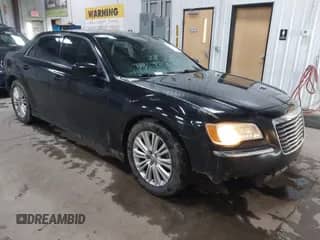 2013 Chrysler 300 with VIN 2C3CCARG0DH736159, listed as a IAAI auction lot 41941042 with 137,661 mi miles and . Bid and sale history available at DreamBid. Image 1.