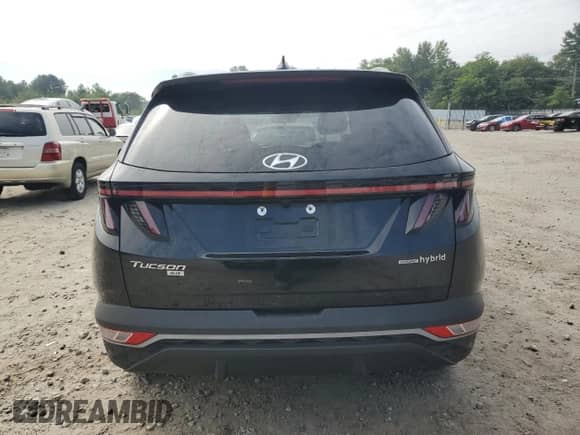 2022 Hyundai Tucson Blue with VIN KM8JBCA10NU025158, listed as a Copart auction lot 67602605 with 15,299 mi miles and Salvage title. Bid and sale history available at DreamBid. Image 6.