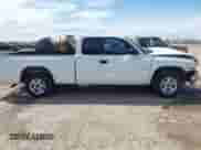 1999 Dodge Dakota SLT z VIN 1B7GL22X6XS186007, wystawiony jako IAAI lot #41953254 z przebiegiem 322 541 mil mil oraz . Historia ofert i sprzedaży dostępna na DreamBid. Obrazek 14.