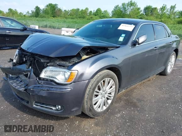 2013 Chrysler 300 with VIN 2C3CCARG1DH543342, listed as a IAAI auction lot 42469777 with 114,360 mi miles and . Bid and sale history available at DreamBid. Image 2.