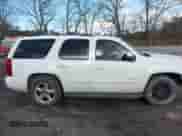 2009 Chevrolet Tahoe 1LT z VIN 1GNEC23359R233645, wystawiony jako IAAI lot #41541396 z przebiegiem 201 830 mil mil oraz . Historia ofert i sprzedaży dostępna na DreamBid. Obrazek 13.