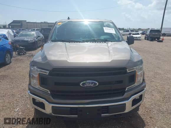 2020 Ford F-150 XL z VIN 1FTFX1E52LKE86867, wystawiony jako IAAI lot #42839570 z przebiegiem 48 171 mil mil oraz . Historia ofert i sprzedaży dostępna na DreamBid. Obrazek 6.