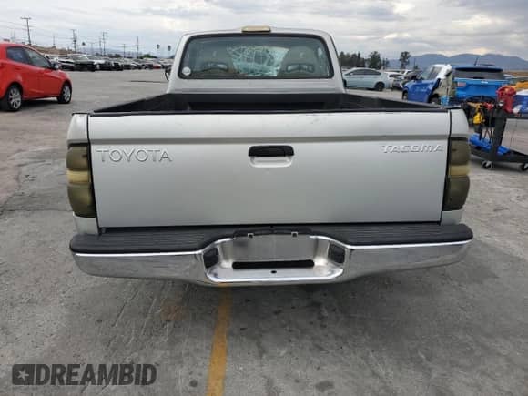 2002 Toyota Tacoma with VIN 5TENL42N82Z080549, listed as a Copart auction lot 80899715 with 115,239 mi miles and Salvage title. Bid and sale history available at DreamBid. Image 6.