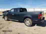 2006 Ford F-150 XLT with VIN 1FTRX12556FA00633, listed as a Copart auction lot 69362735 with 163,277 mi miles and Salvage title. Bid and sale history available at DreamBid. Image 2.