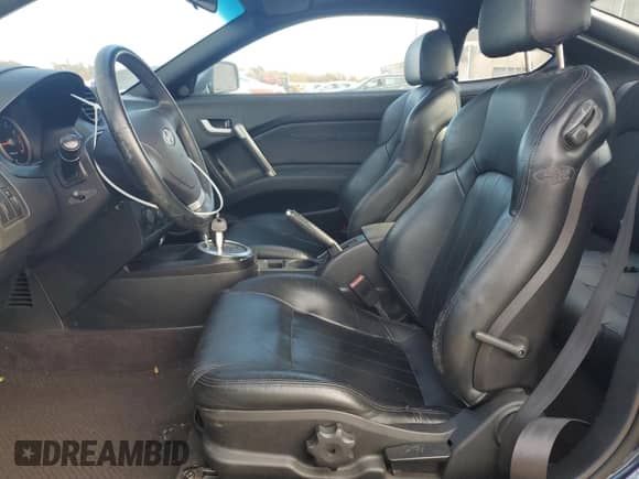 2003 Hyundai Tiburon GT с VIN KMHHN65F53U061177, выставлен на аукционе Copart как лот 78029034 с пробегом 80 564 миль миль и Списание • Salvage title. История ставок и продаж доступна на DreamBid. Изображение 7.