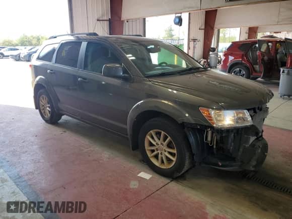 2015 Dodge Journey SXT with VIN 3C4PDDBG0FT651497, listed as a Copart auction lot 71617105 with 92,765 mi miles and Salvage title. Bid and sale history available at DreamBid. Image 4.