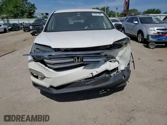 2018 Honda Pilot LX с VIN 5FNYF6H14JB059461, выставлен на аукционе Copart как лот 62061885 с пробегом 197 618 миль миль и Списание • Salvage title. История ставок и продаж доступна на DreamBid. Изображение 13.