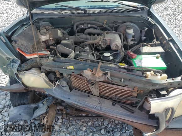 2002 Toyota Tacoma с VIN 5TENL42NX2Z025973, выставлен на аукционе Copart как лот 84580115 с пробегом 289 670 миль миль и Списание • Salvage title. История ставок и продаж доступна на DreamBid. Изображение 11.