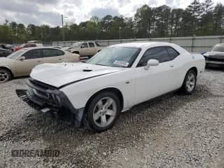 2012 Dodge Challenger R/T Plus with VIN 2C3CDYBT8CH135254, listed as a Copart auction lot 50559265 with 144,011 mi miles and Salvage title. Bid and sale history available at DreamBid. Image 1.