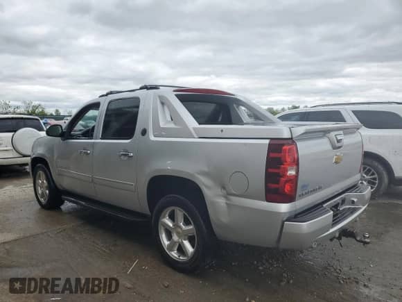 2013 Chevrolet Avalanche LS with VIN 3GNMCEE04DG325726, listed as a Copart auction lot 52709615 with 98,991 mi miles and Salvage title. Bid and sale history available at DreamBid. Image 2.