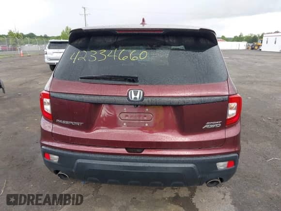 2019 Honda Passport Sport with VIN 5FNYF8H21KB010014, listed as a IAAI auction lot 42334660 with 76,548 mi miles and . Bid and sale history available at DreamBid. Image 16.