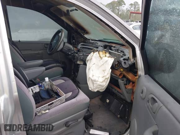2007 Dodge Caravan SE with VIN 1D4GP25B07B154516, listed as a IAAI auction lot 42823010 with Not provided miles and . Bid and sale history available at DreamBid. Image 5.
