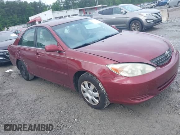 2004 Toyota Camry LE with VIN 4T1BE32KX4U293071, listed as a IAAI auction lot 42371516 with 173,000 mi miles and . Bid and sale history available at DreamBid. Image 1.