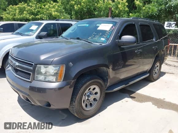 2010 Chevrolet Tahoe LS with VIN 1GNMCAE36AR213931, listed as a IAAI auction lot 42204997 with 289,653 mi miles and . Bid and sale history available at DreamBid. Image 2.