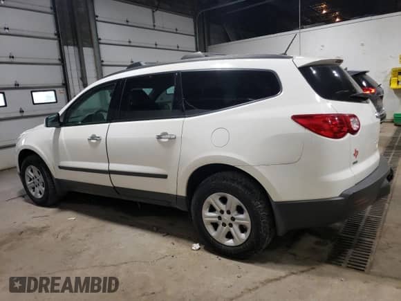 2012 Chevrolet Traverse LS z VIN 1GNKVFED5CJ182793, wystawiony jako Copart lot #82520115 z przebiegiem 149 446 mil mil oraz Szkoda całkowita • Salvage title. Historia ofert i sprzedaży dostępna na DreamBid. Obrazek 2.
