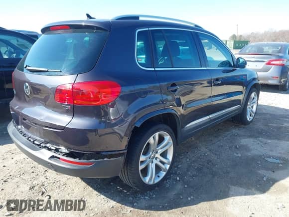2016 Volkswagen Tiguan S with VIN WVGAV7AX6GW546573, listed as a IAAI auction lot 41672697 with 117,174 mi miles and . Bid and sale history available at DreamBid. Image 4.