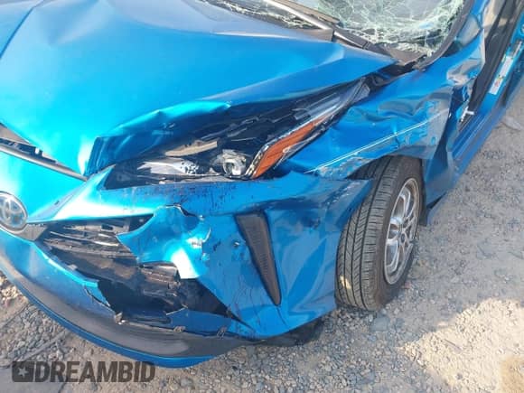 2021 Toyota Prius L Eco with VIN JTDKAMFU1M3136133, listed as a IAAI auction lot 43285926 with 49,911 mi miles and . Bid and sale history available at DreamBid. Image 16.