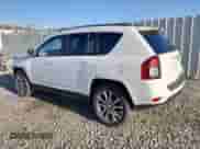 2017 Jeep Compass Latitude with VIN 1C4NJCEA9HD130529, listed as a Copart auction lot 52049285 with 82,338 mi miles and Salvage title. Bid and sale history available at DreamBid. Image 2.