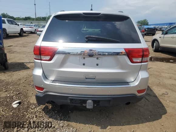 2011 Jeep Grand Cherokee Overland Summit with VIN 1J4RR6GTXBC536210, listed as a Copart auction lot 62634765 with 129,835 mi miles and Salvage title. Bid and sale history available at DreamBid. Image 6.