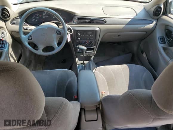 2004 Chevrolet Malibu Classic z VIN 1G1ND52F44M579641, wystawiony jako Copart lot #70719605 z przebiegiem 205 258 mil mil oraz Szkoda całkowita • Salvage title. Historia ofert i sprzedaży dostępna na DreamBid. Obrazek 8.