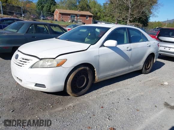 2009 Toyota Camry XLE with VIN 4T1BE46K39U808080, listed as a IAAI auction lot 43443664 with 256,321 mi miles and . Bid and sale history available at DreamBid. Image 2.