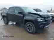 2021 Chevrolet Colorado 4WD Z71 z VIN 1GCGTDEN7M1282445, wystawiony jako IAAI lot #41737419 z przebiegiem 27 187 mil mil oraz . Historia ofert i sprzedaży dostępna na DreamBid. Obrazek 1.