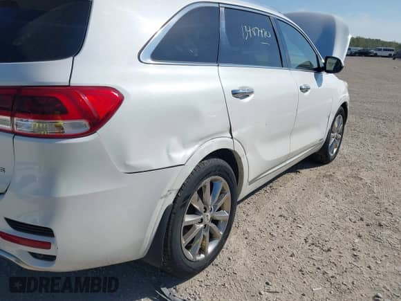 2016 Kia Sorento SXL z VIN 5XYPKDA53GG086158, wystawiony jako IAAI lot #43352887 z przebiegiem 168 301 mil mil oraz . Historia ofert i sprzedaży dostępna na DreamBid. Obrazek 6.