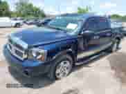 2006 Dodge Dakota SLT with VIN 1D7HE48K96S503482, listed as a IAAI auction lot 42412162 with 127,360 mi miles and . Bid and sale history available at DreamBid. Image 2.