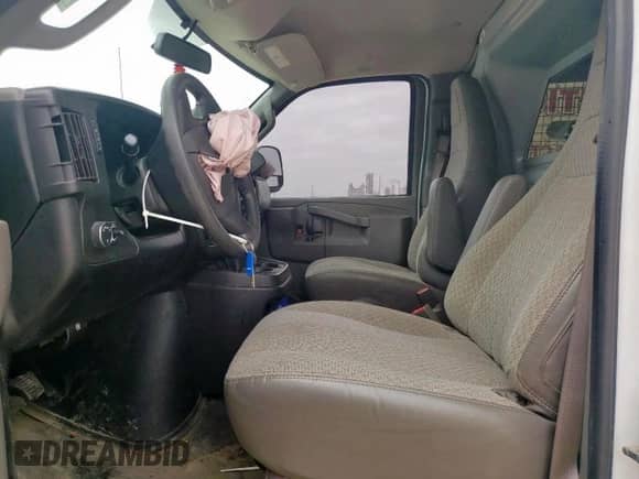 2020 Chevrolet Express Cargo with VIN 1GCWGAFP7L1127228, listed as a Copart auction lot 58584465 with 83,826 mi miles and Salvage title. Bid and sale history available at DreamBid. Image 7.