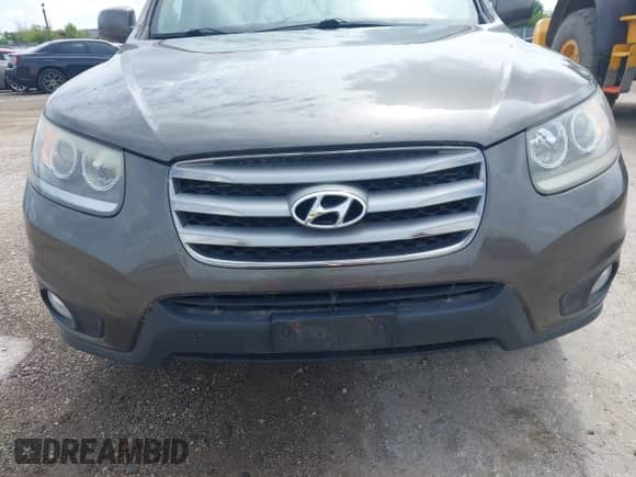 2012 Hyundai Santa Fe Limited with VIN 5XYZK4AG8CG118820, listed as a IAAI auction lot 42361850 with 298,744 mi miles and . Bid and sale history available at DreamBid. Image 15.
