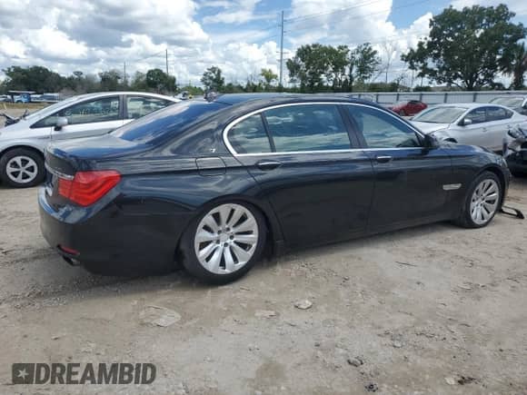 2011 BMW 7 Series with VIN WBAKX8C57BC198326, listed as a Copart auction lot 69985174 with 142,353 mi miles and Clean title. Bid and sale history available at DreamBid. Image 3.