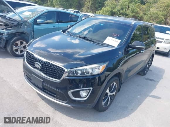 2018 Kia Sorento EX with VIN 5XYPH4A11JG403244, listed as a IAAI auction lot 43359705 with 87,891 mi miles and . Bid and sale history available at DreamBid. Image 2.