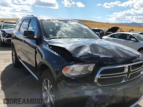 2014 Dodge Durango Limited with VIN 1C4RDJDG8EC557821, listed as a Copart auction lot 80311115 with 160,753 mi miles and Salvage title. Bid and sale history available at DreamBid. Image 14.