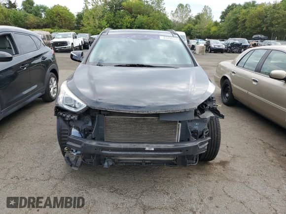 2015 Hyundai Santa Fe с VIN 5XYZUDLB1FG291563, выставлен на аукционе Copart как лот 81298555 с пробегом 91 887 миль миль и Списание • Salvage title. История ставок и продаж доступна на DreamBid. Изображение 5.