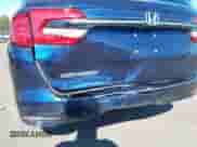 2021 Honda Odyssey EX-L with VIN 5FNRL6H76MB001373, listed as a IAAI auction lot 42951503 with 24,219 mi miles and . Bid and sale history available at DreamBid. Image 6.